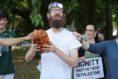 Jake holding a challah. 