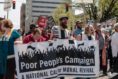 Jake marching with others with a "Poor People's Campaign" banner. 